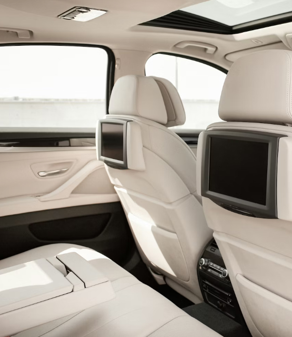 luxury sedan with driver